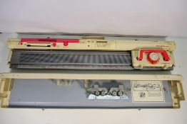 A Toyota KS858 knitting machine contained in carry case.