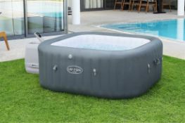 A Lay-Z-Spa Hawaii, with an 840 litre capacity, measuring 71 cm x 180 cm x 180 cm when inflated,