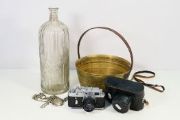 Lot to include a silver plated powder compact of octagonal section,