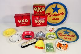 A collection of advertising trays, ashtrays and similar to include Martini, Carlsberg, OXO,