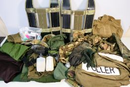 Ex MOD uniform and accessories, mostly camouflage, to include 2 x pack frames,