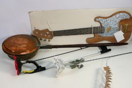 Lot to include wooden guitar form wall art, bed warmer, decorative flower models and other.