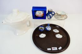 Lot to include ceramic bottle labels, novelty teapot in the form of a lavatory,