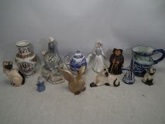 A collection of ceramics to include a Beswick Siamese cat, a Lladro (approx 27 cm tall,