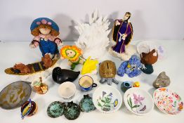 A box of mixed ceramics.