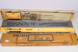 A Brother KH860 knitting machine contained in carry case and a Brother Knitleader KL116, boxed. [2].