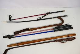 A quantity of riding crops and other.
