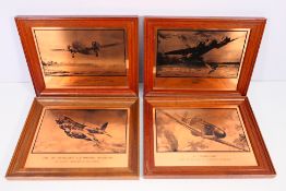 A collection of four framed copper decorated art of aircraft,