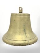 A brass ship's bell with clapper, height 17cm.