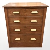 A 1920's ship's teak and pine chest of four drawers, 76 cm x 57 cm x 90 cm.