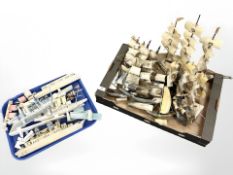 A collection of carved and polished horn model ships, further carved hardstone examples.