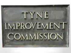 A Tyne Improvement Commission patinated brass wall plaque, 80 cm x 51 cm.