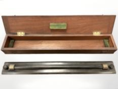 A rolling rule by Adie & Son, Edinburgh, length 60cm, in teak storage case.