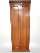 A 1920's ship's teak double door wardrobe closet, 75 cm x 55 cm x 198 cm.