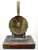 A patinated-brass Teleflex ship's telegraph, mounted on wooden plinth, height 37cm.