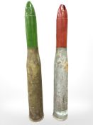 Two large inert naval/artillery shells, tallest 86cm.