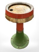 A painted cast iron and coopered oak circular occasional table, height 74 cm.