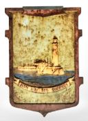 A very heavy painted cast iron shield-shaped plaque depicting St Mary's Lighthouse,