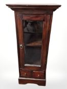 A reproduction single door side cabinet,