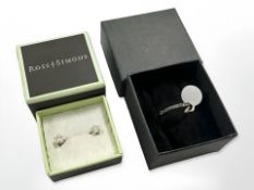 A 9ct yellow gold band ring set with cubic zirconia together with a pair of star shaped 9ct gold