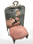 A painted Art Nouveau fire screen and a small stool.