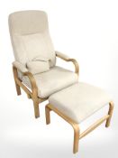 A Scandinavian bent wood lounge chair in oatmeal fabric with matching footstool