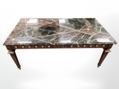 A French style mahogany rectangular coffee table with gilt metal mounts and polished granite top,