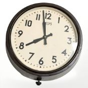 A 1930's Smiths Bakelite eight day wall clock, diameter 26 cm.