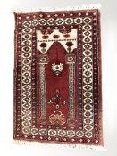 An Afghan prayer rug,