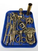 Brass wares to include letter knives, figural door knocker, hour glass, ammunition shell,