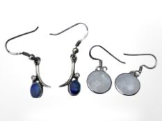 A pair of silver diamond and opal earrings,