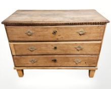 A 19th century Continental oak three drawer chest,