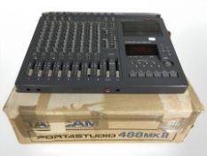 A Tascam Portastudio 488 Mk II, with original box.
