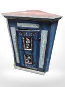 A Scandinavian painted pine hanging corner cabinet,