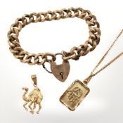 An antique 9ct gold padlock bracelet, together with two eastern gold-plated pendants, one on chain.