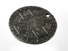 A George III sixpence, 1787.