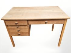 A 20th century Danish oak single pedestal writing desk, 105 cm x 60 cm x 73 cm.