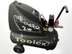 A Toolex air compressor.