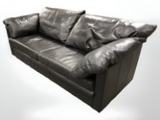 A late 20th century black leather three seater settee, 202 cm x 100 cm x 82 cm.