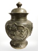 A reproduction Chinese bronze lidded temple jar, height 24 cm.