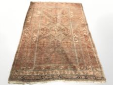 An antique Balouch rug, Afghanistan, 174 cm x 113 cm.