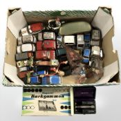 A quantity of play worn die cast vehicles, backgammon set, vintage Gillette razor, etc.