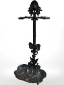 A cast iron stick stand, height 59 cm.