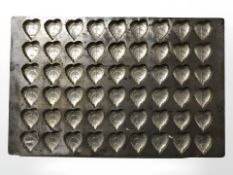 A vintage leaf pattern sweet / biscuit mould, width 42 cm.