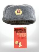 A Russian Ushanka hat together with a one volume James Bond 'From Russia with Love' (2)