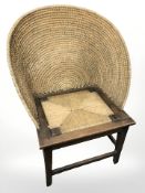 An unusual low back oak framed Orkney chair,