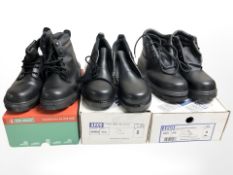 Three boxed pairs of works boots,