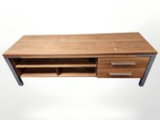 A contemporary teak and chrome low entertainment sideboard,