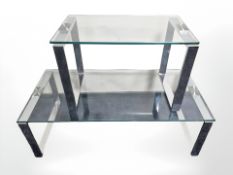 A contemporary glass topped rectangular coffee table on chrome supports, length 115 cm,