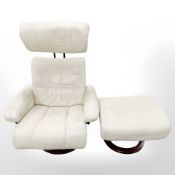 A 20th century Scandinavian stained bent wood cream leather swivel lounge chair and matching stool